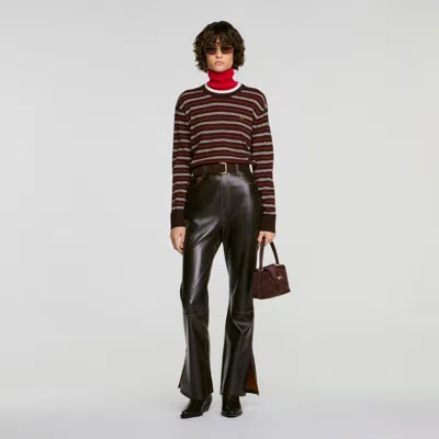 Sandro Distressed Leather Trousers In Brown