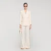 Sandro Double-breasted Suit Jacket In Neutral