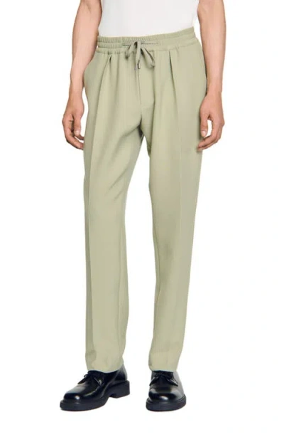 Sandro Elasticated Straight-leg Trousers In Green