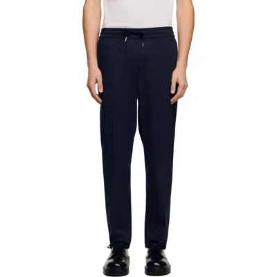 Sandro Elasticated Straight-leg Trousers In Black
