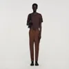 Sandro Elasticated Straight-leg Trousers In Brown