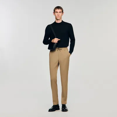 Sandro Elasticated Straight-leg Trousers In Nude