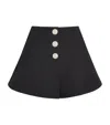 Sandro Snap Front Flared Shorts In Black
