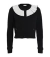 Sandro Cardigan With Contrast Collar In Black