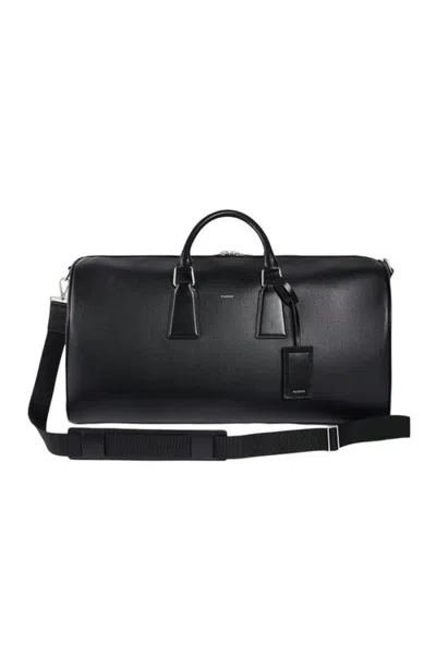 Sandro Grained Leather Weekend Bag In Black
