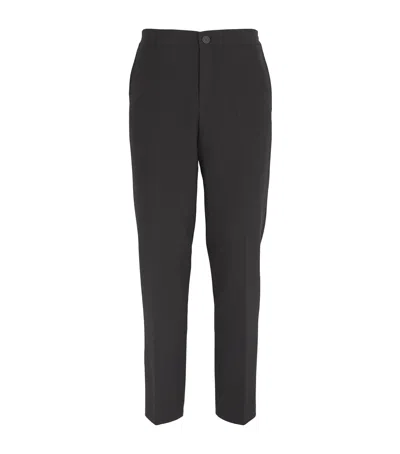 Sandro Jersey Straight Tailored Trousers In Black