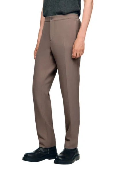 Sandro Jersey Trousers In Brown