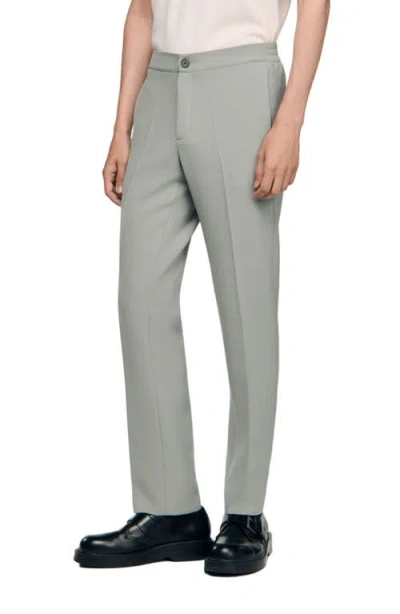 Sandro Jersey Trousers In Green