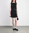 Sandro Knitted Buttoned Mini Skirt In Black