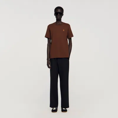 SANDRO T-SHIRT À LOGO EN CUIR
