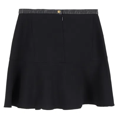 Sandro Leather Trim Mini Flared Skirt In Black Wool