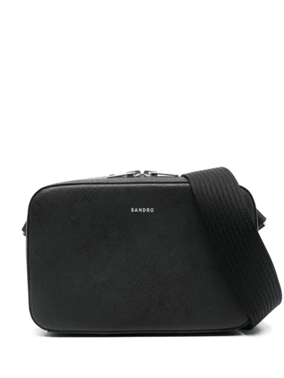 Sandro Logo-debossed Messenger Bag In Black