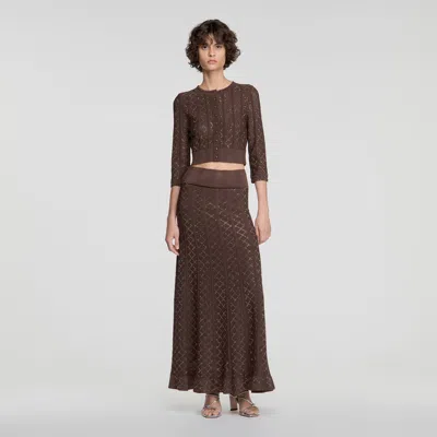 Sandro Long Rhinestone Knit Skirt In Brown