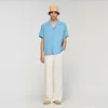 Sandro Loose-fit Shark Collar Shirt In Blue