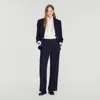 Sandro Mixed-material Satin Trousers In Black
