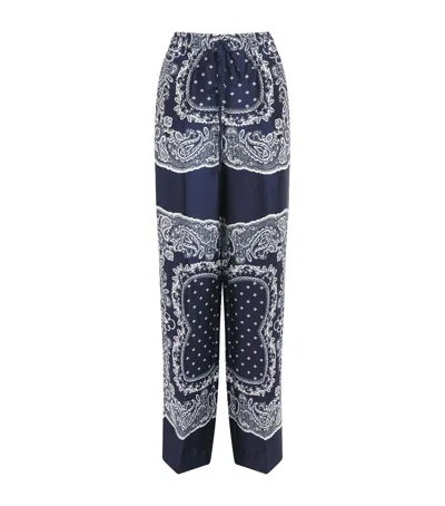 Sandro Paisley Print Trousers In Blue