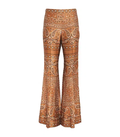 Sandro Paris Bandana Print Flared Trousers In Brown