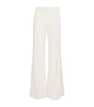 Sandro Paris Flared Tailored Trousers In Neutral