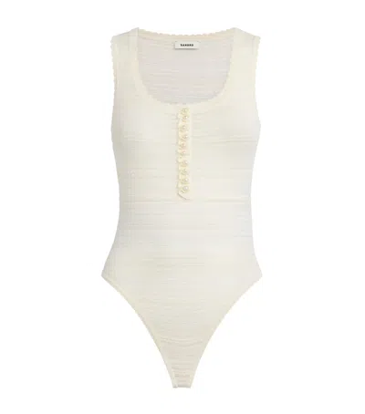 Sandro Paris Knitted Sleeveless Bodysuit In Beige