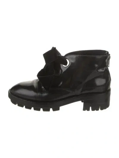 Pre-owned Sandro Patent Leather Boots In Black