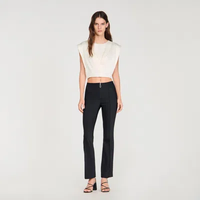 Sandro Pleat And Zip Trousers In Black