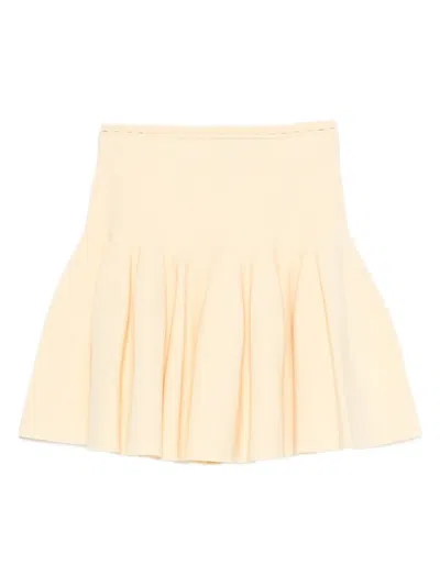 Sandro Pleated Knitted Mini Skirt In Yellow
