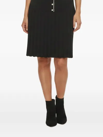 Pre-owned Sandro Pleated Midi Skirt In Black