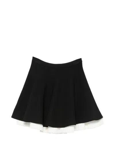 Sandro Pleated-hem Knitted Mini Skirt In Black