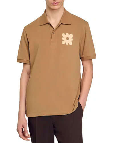 SANDRO POLO SHIRT WITH FLOWER PATCH
