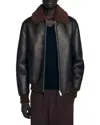 Sandro Reversed Leather Jacket In Black