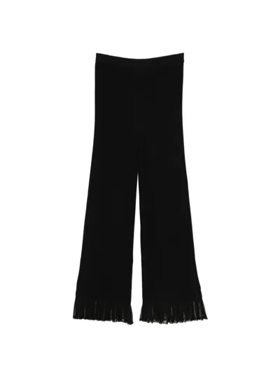 Sandro Ribbed Trousers In Black
