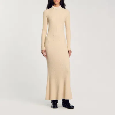 Sandro Robe Longue En Maille In Sand