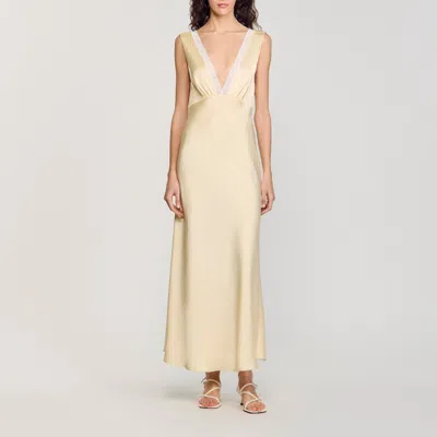 Sandro Robe Longue Satinée In Yellow