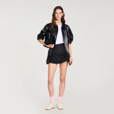 Sandro Ruffled Skort With Topstitching In Black