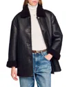 Sandro Shearling Coat In Black