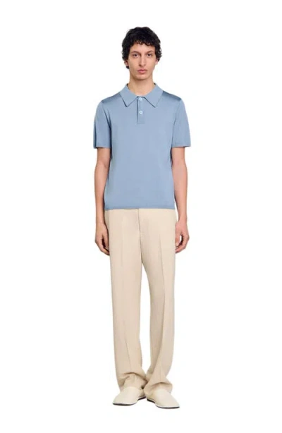 Sandro Short-sleeve Knitted Polo Shirt In Chambray.