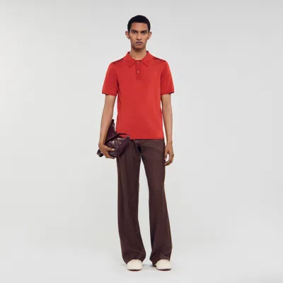 Sandro Short-sleeve Knitted Polo Shirt In Orange