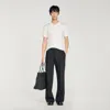 Sandro Short-sleeve Knitted Polo Shirt In White