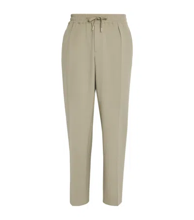 Sandro Stretch-jersey Straight-leg Trousers In Green