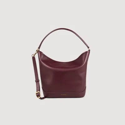 Sandro Tangoso Leather Bucket Bag In Burgundy