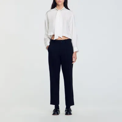 Sandro Technical Material Trousers In Black