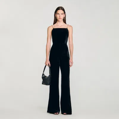 Sandro Velvet Jumpsuit With Removable Straps In Black