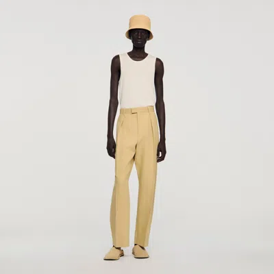 Sandro Gerard Wide Pleated Cotton Linen Trousers In Yellow