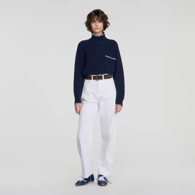 Sandro Alban Whipstitch Turtleneck Sweater In Blue