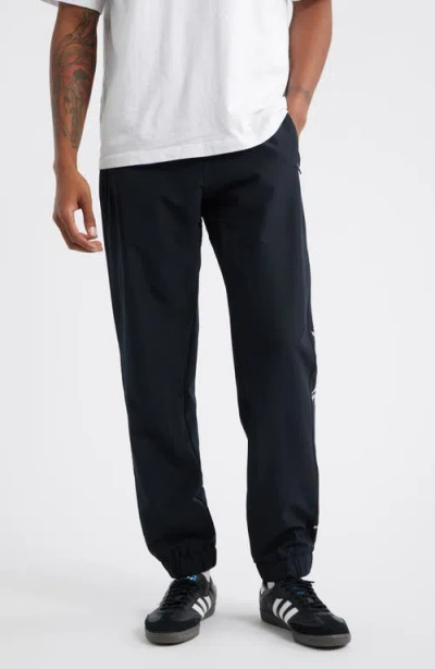 Santo Studio Tempo Faith Over Fear Tech Pants In Black