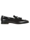 Santoni Black Leather Moccasin With Tapered Toe And Decorative Tassels In Black