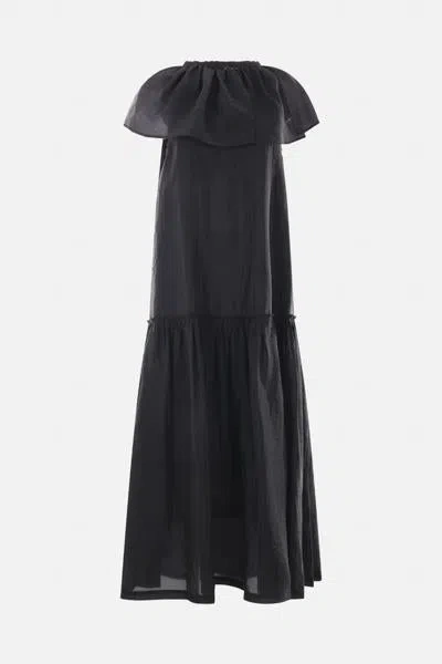 Sara Lanzi Dresses In Black