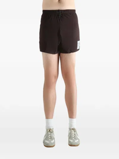 Satisfy Perforated Drawstring Shorts In Black