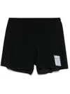Satisfy Peaceshell Performance Shorts In Schwarz