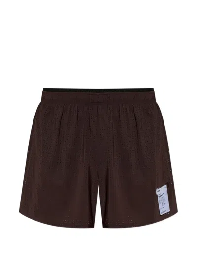 Satisfy Space-o Perforated Shorts In Brown